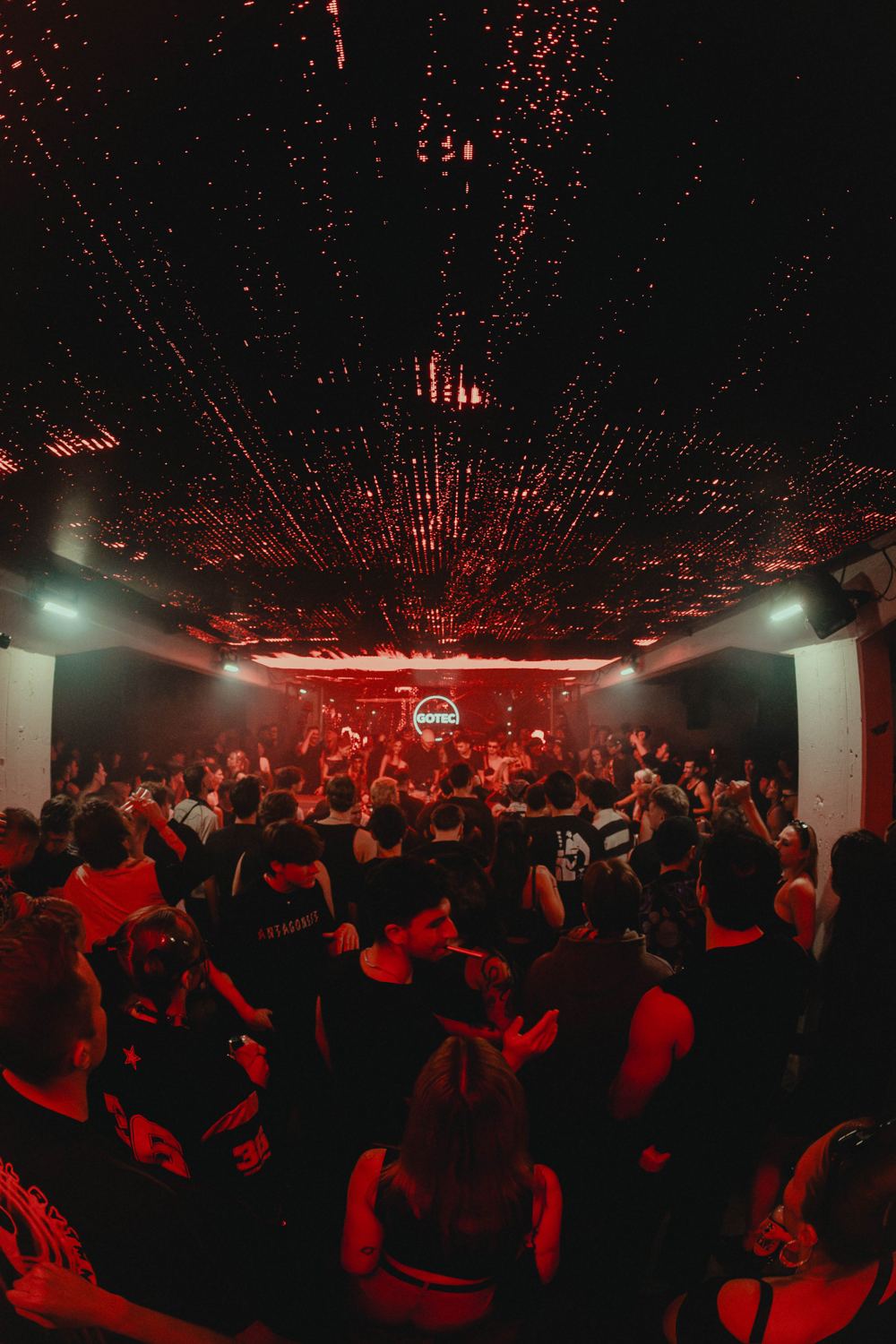 Full dancefloor facing the DJ booth